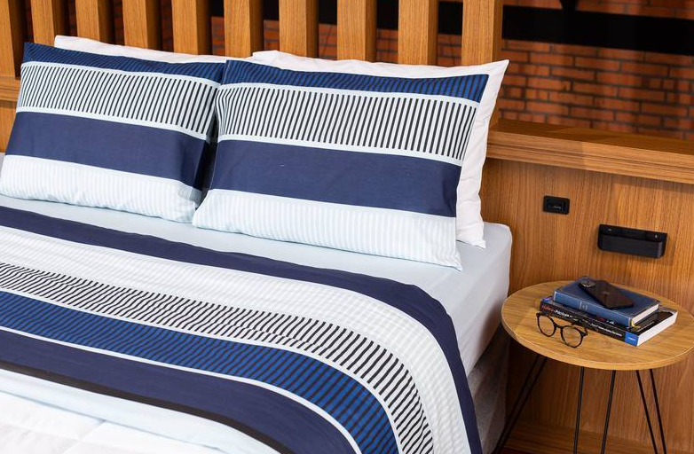 Qual a diferença entre jogo de cama percal e outras opções no atacado?